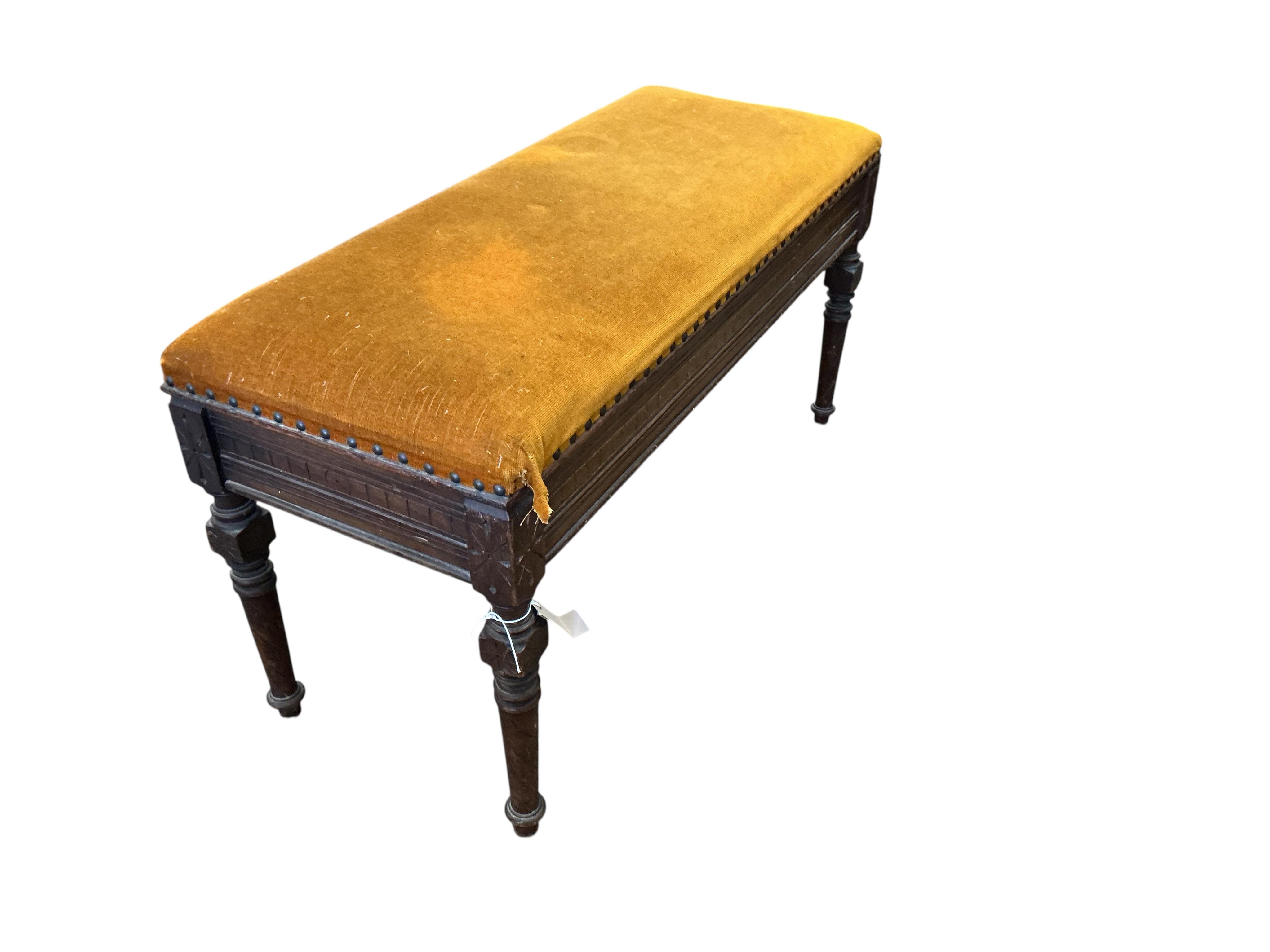 A late Victorian mahogany Aesthetic movement box seat duet piano stool, width 92cm, depth 38cm, height 47cm